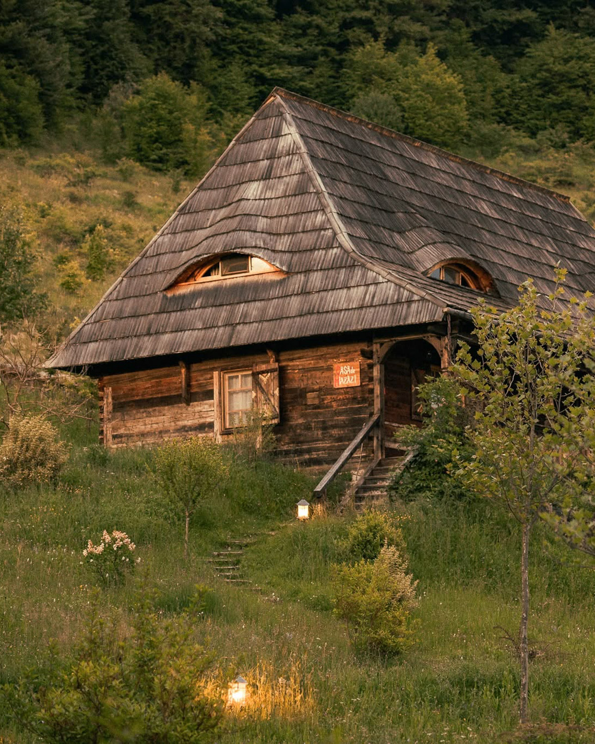 Traditional wooden cottage at Raven's Nest in the Apuseni Mountains