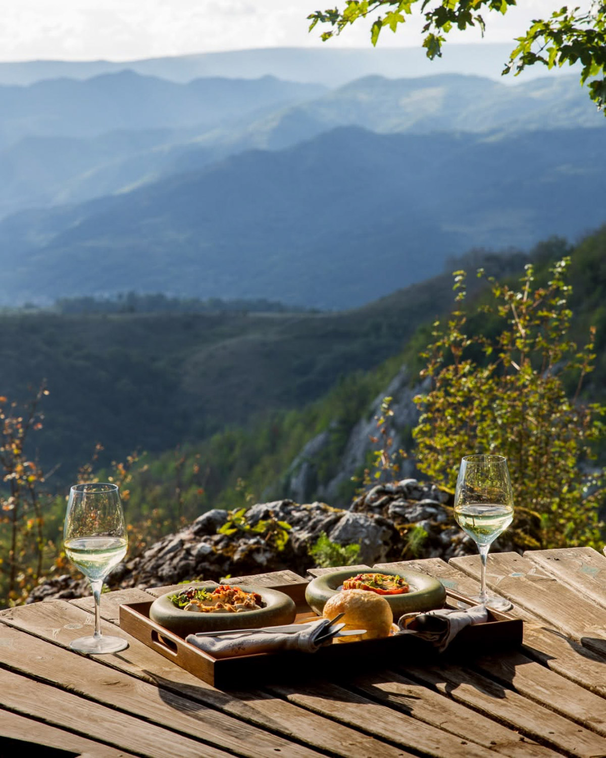 Outdoor meal overlooking the Apuseni Mountains at Raven's Nes
