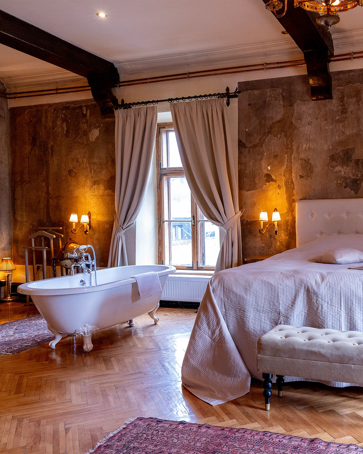 Guest room with freestanding bathtub at Zabola Estate